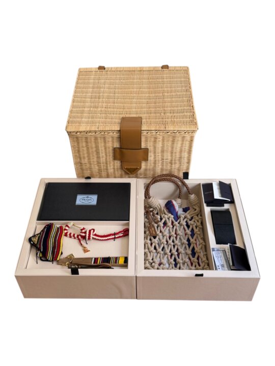 132: PRADA - Summer Kit 2025, a Collection of Six Luxury Accessories in a Wicker Trunk