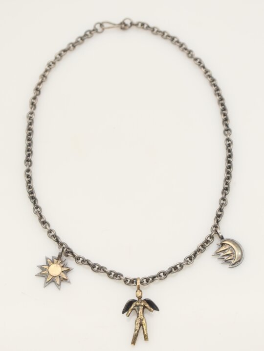 158: Zolotas, An 18K Gold and Silver Necklace with Sun, Eros and Crescent Moon Motifs